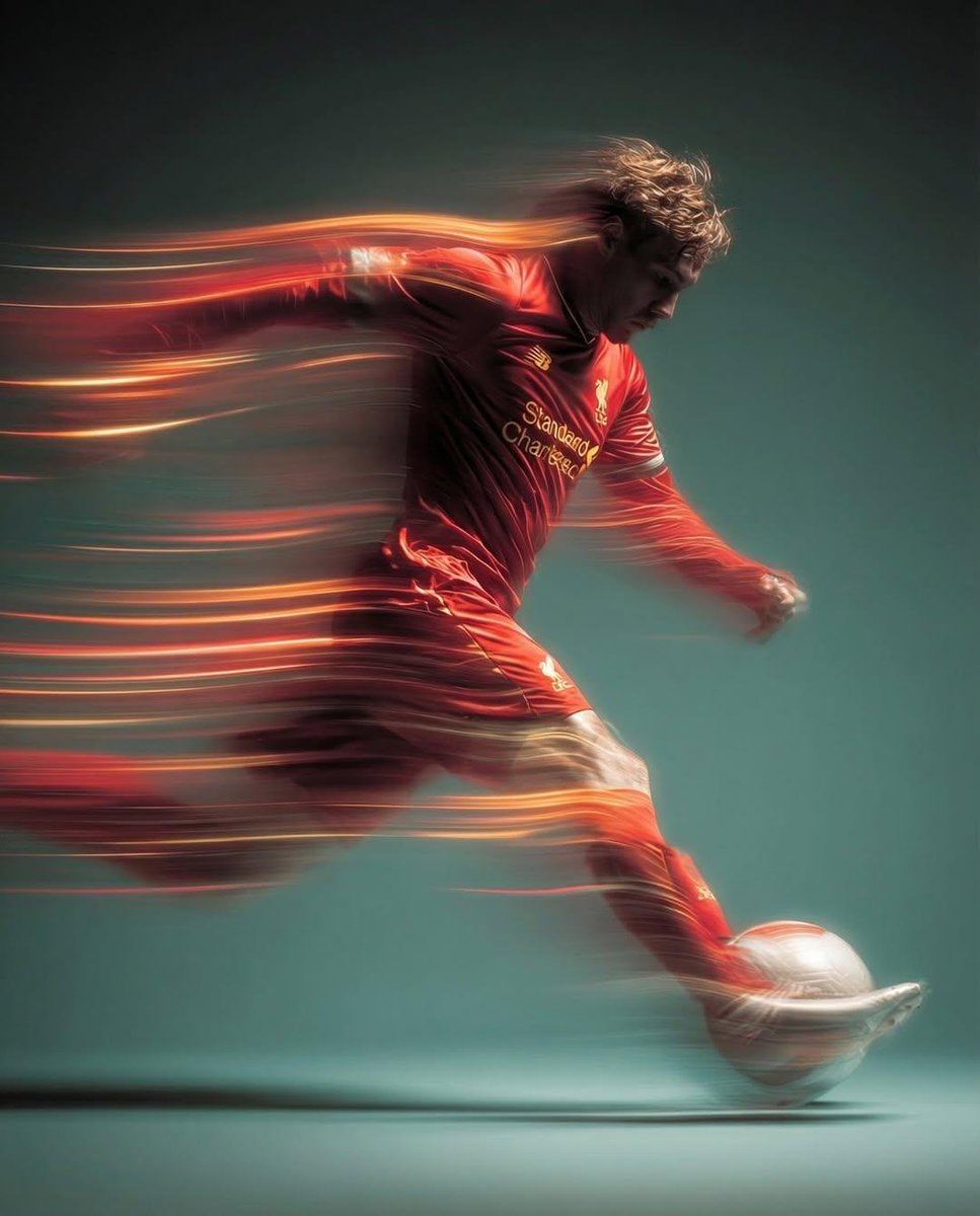 Panning shot of a mysterious soccer player in red proffesional soccer jearsy mid air kicking a ball, motion blur, cinem... example 2